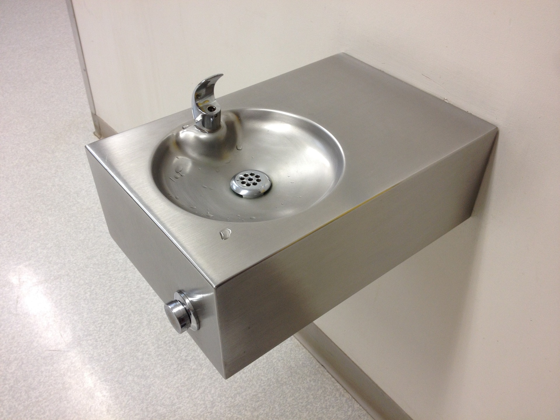 drinking water out of public bathroom sink